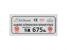 9 Kişilik 675 kg Asansör Kapasite Etiketi
